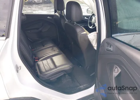 2016 Ford Escape Titanium z USA, uszkodzony, nr VIN 1FMCU9JXXGUA51005